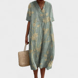 ODA | Elegant blomstret kjole