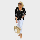 Birgitte – Blomsterbluse med blød snøre