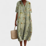 ODA | Elegant blomstret kjole